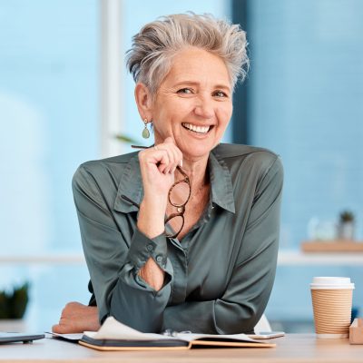 Business, woman and portrait of a mature ceo proud of her startup company success in a corporate office. Mature entrepreneur, face and front of a female executive happy with her professional career.